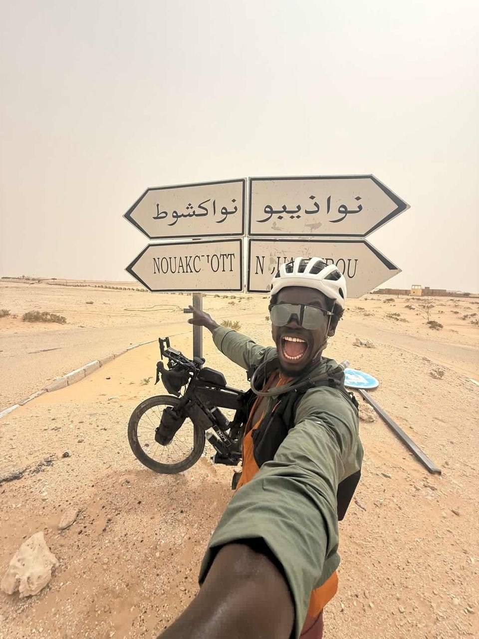 Ghanaian cyclist nears end of epic intercontinental journey to champion education