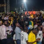 A section of fans watching the game at one of the viewing centres
