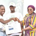 500 women farmers Ms Alexandra left presenting the items to Hajia Abdul Aziz Fatahiya right