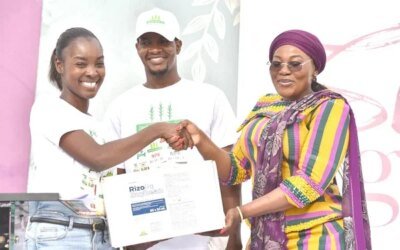 500 women farmers Ms Alexandra left presenting the items to Hajia Abdul Aziz Fatahiya right