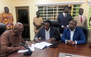 MOFA Mr Opoku left with Mr Adimado and others during the signing ceremony