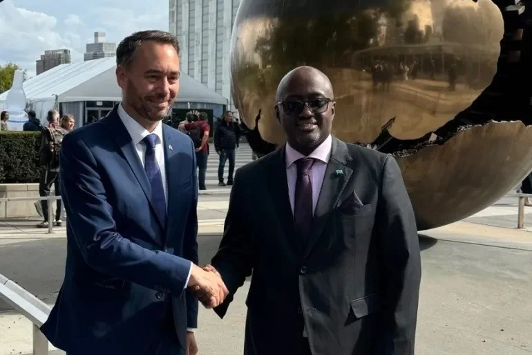 Rwandan Foreign Minister Olivier Nduhungirehe right meets with Belgian Foreign Minister Maxime Prevo