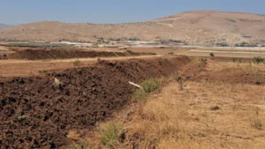A trench dug by Israel around the Bedouin community to besiege the residents and restrict their move