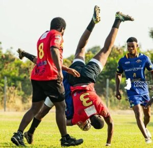 Bulls Captain Martin Oko BuabengRed tackling Godfred Aikins of Nungua Tigers