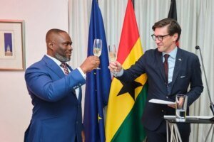 German President Mr Landscoft right and Mr Adjei proposing a toast during the reception