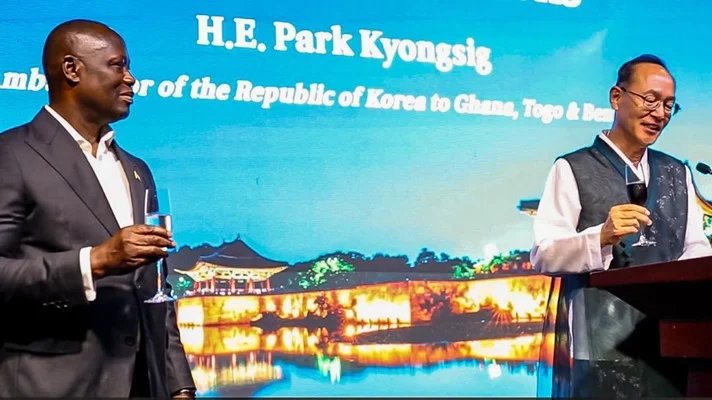 Ghana Korea Mr Park right proposing a toast with Mr Buah during the programme