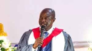 Methodist Church Mr Attah Antwi inset addressing the congregation