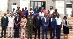 Mr Haruna Iddrisu sixth from right with Mr Gilbert Adjei fourth from right and members of the counci